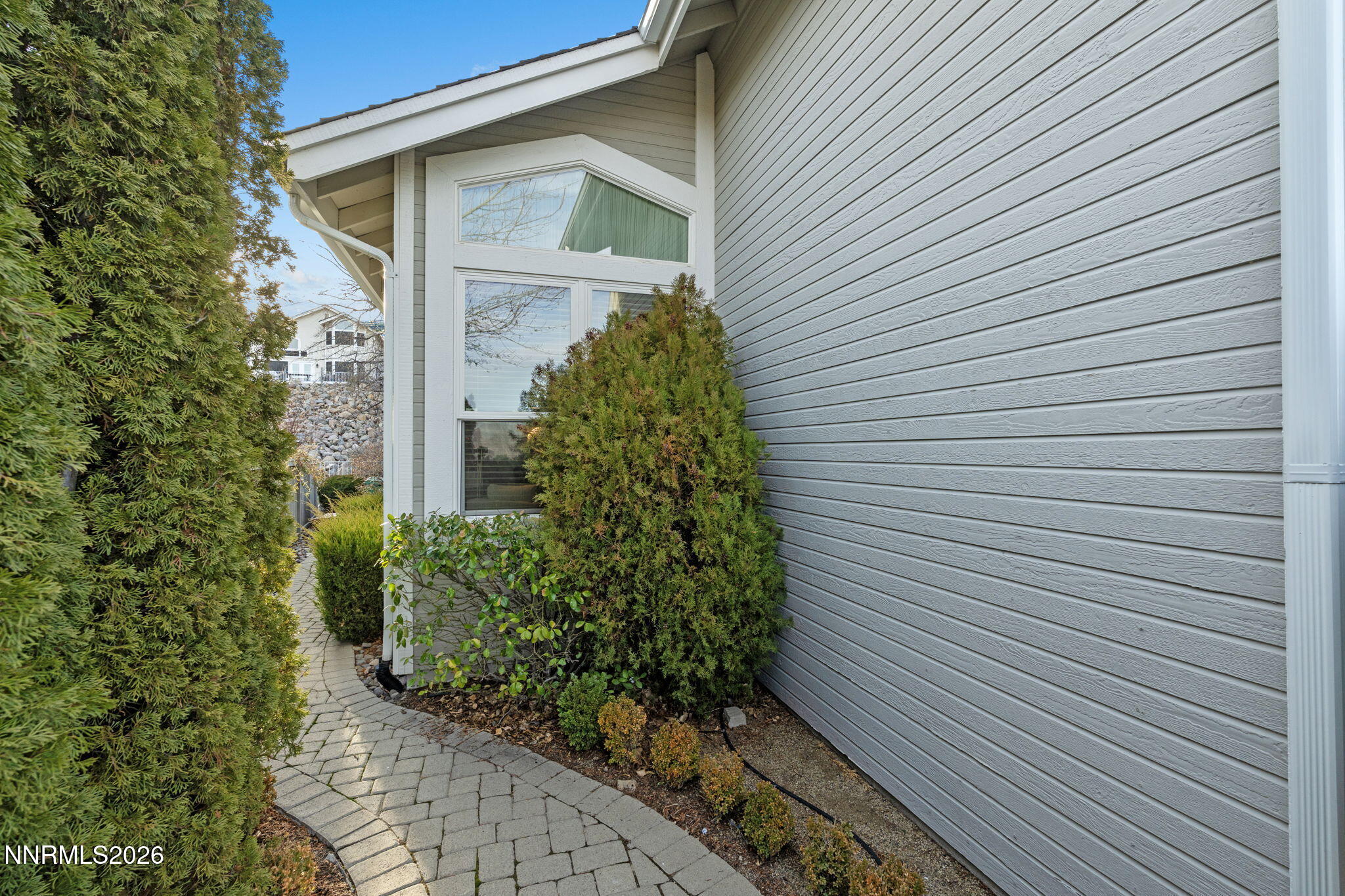 6186 Squires Lane Reno, NV 89519 - Photo 41 of 57 a view of a house with a yard