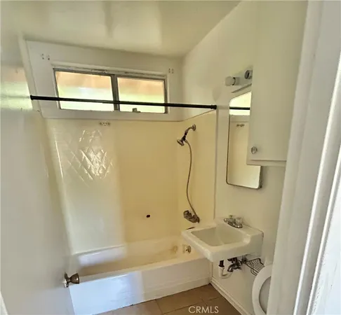 a bathroom with a sink and a bathtub