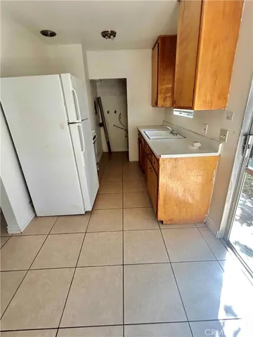 a bathroom with a sink a mirror and a bath tub