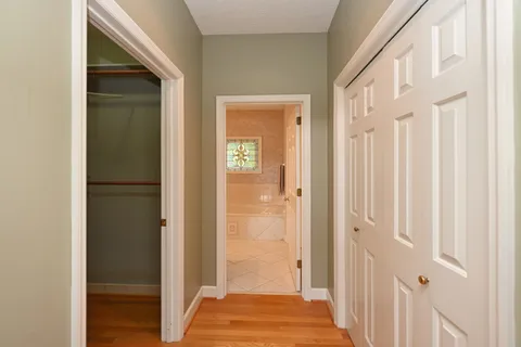 a view of a bathroom from the hallway