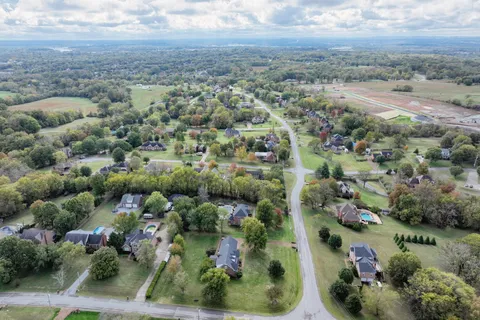 an aerial view of house with outdoor space