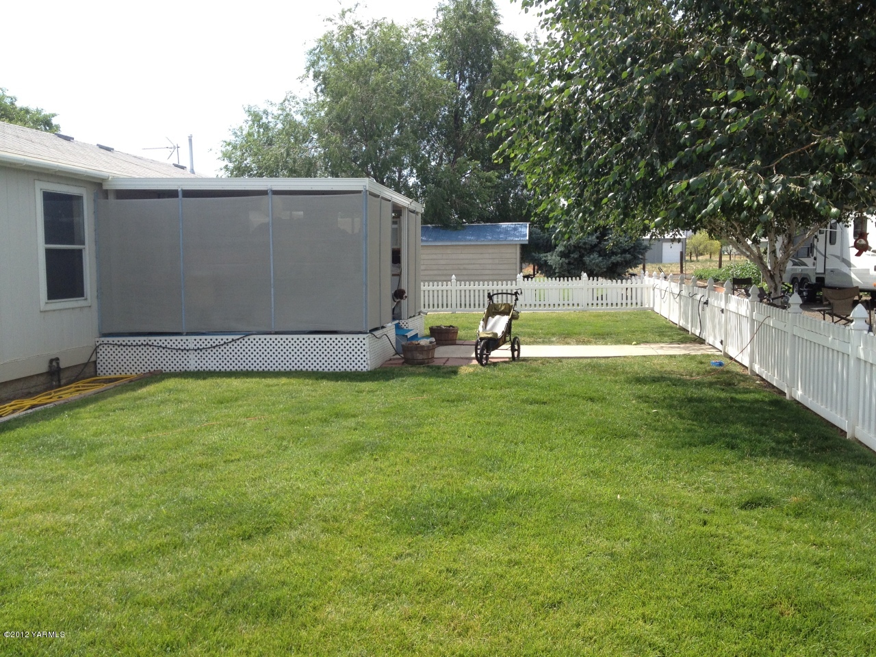 15191 Douglas Road Yakima, WA 98908 - Photo 22 of 43 a view of backyard with swimming pool and seating space