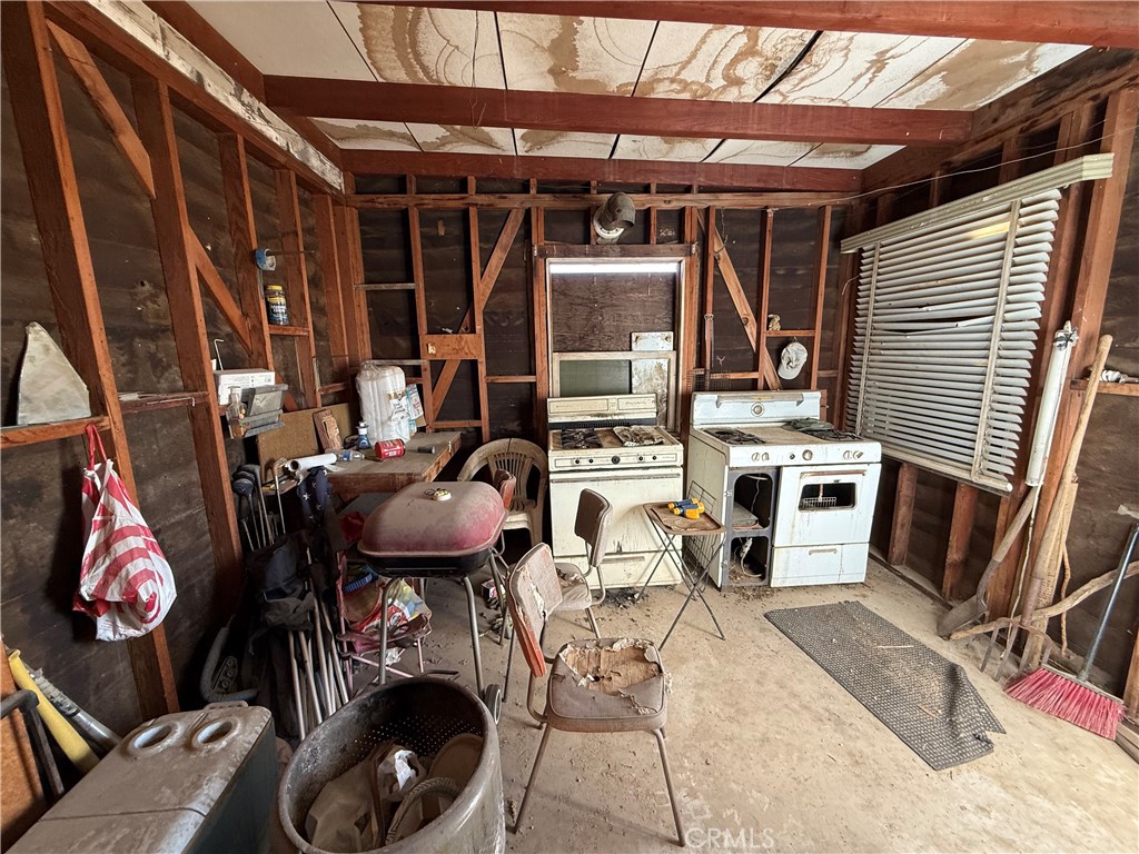 62823 Appian Way Joshua Tree, CA 92252 - Photo 24 of 25 a view of a chairs and tables in patio