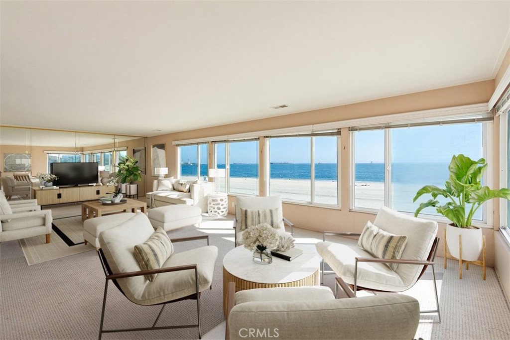 21 7th Place, Unit 409 Long Beach, CA 90802 - Photo 3 of 16 a living room with furniture and a large window