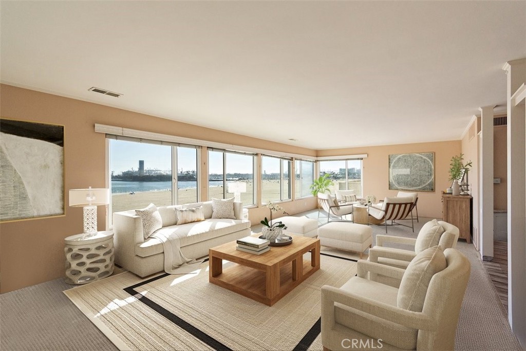 21 7th Place, Unit 409 Long Beach, CA 90802 - Photo 4 of 16 a living room with furniture and a large window
