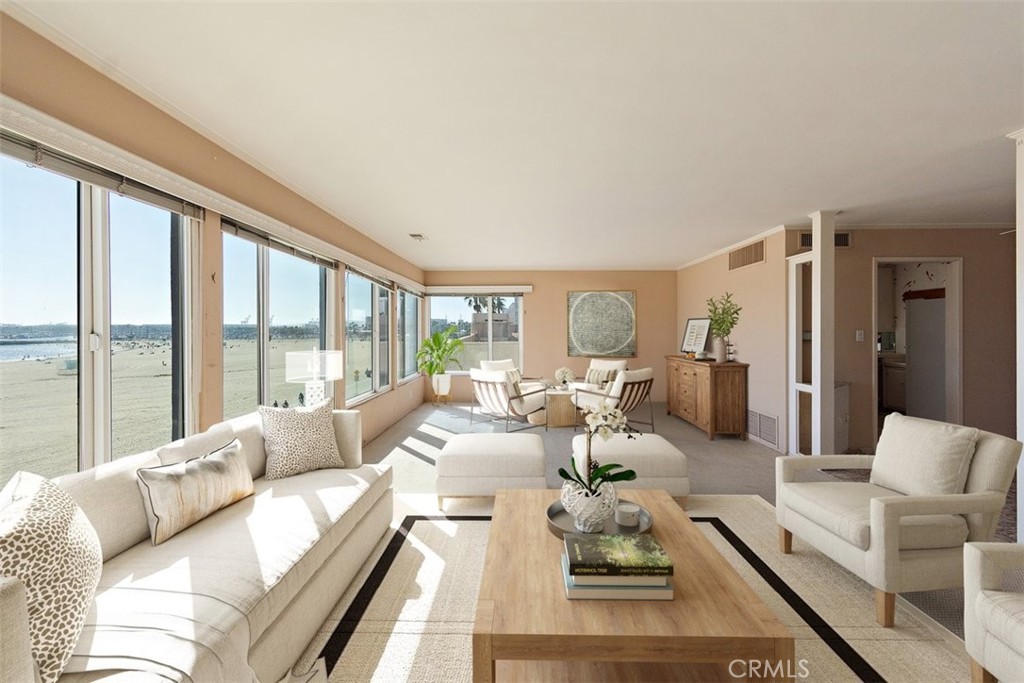 21 7th Place, Unit 409 Long Beach, CA 90802 - Photo 5 of 16 a living room with furniture and large windows
