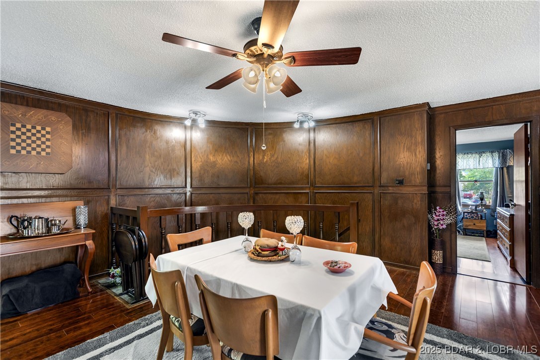 31945 Idle Wild Road Gravois Mills, MO 65037 - Photo 14 of 57 Dining, Staircase, & primary bedroom