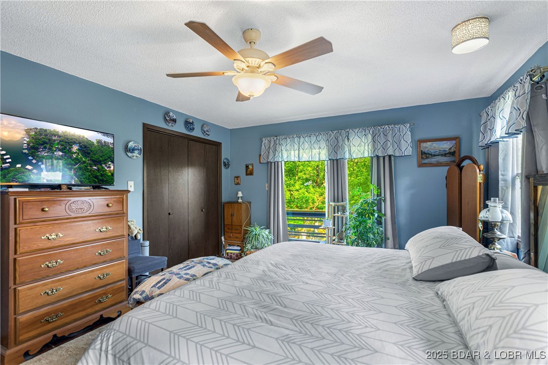 31945 Idle Wild Road Gravois Mills, MO 65037 - Photo 16 of 57 Primary Bedroom