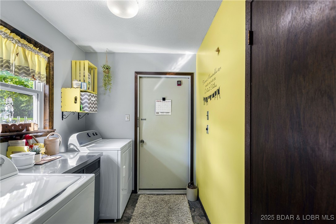 31945 Idle Wild Road Gravois Mills, MO 65037 - Photo 19 of 57 Laundry area & door to garage. 1/2 bath on Rt