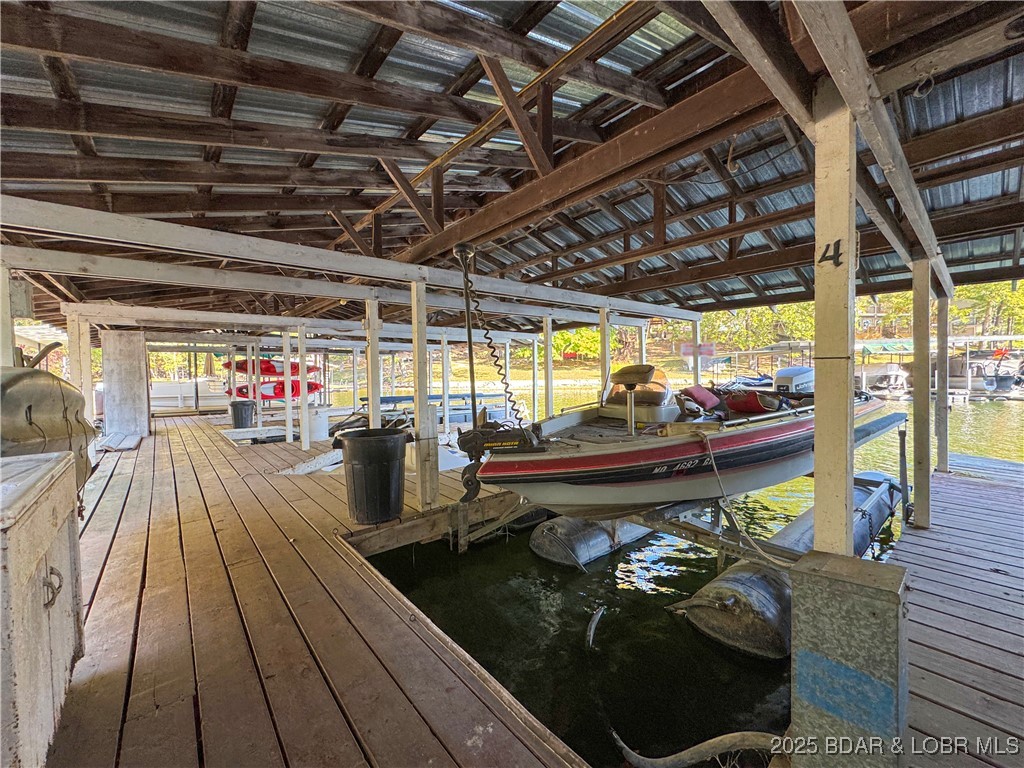 31945 Idle Wild Road Gravois Mills, MO 65037 - Photo 46 of 57 Community Slip #4, Boat, & Hoist Included