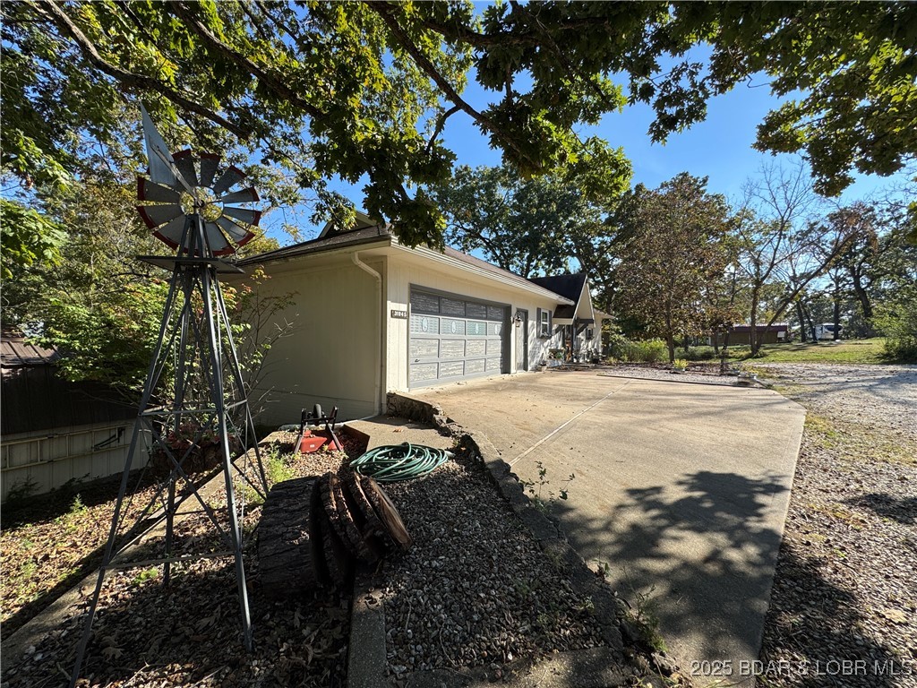 31945 Idle Wild Road Gravois Mills, MO 65037 - Photo 49 of 57 Attached 2 Car Garage