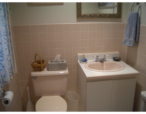 12 Burnside Road Newton, MA 02461 - Photo 17 of 18 a bathroom with a sink toilet and a mirror