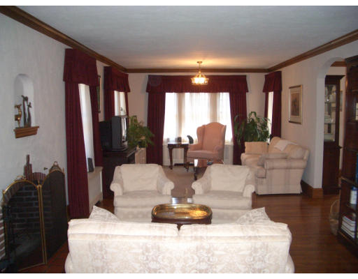 12 Burnside Road Newton, MA 02461 - Photo 3 of 18 a living room with furniture and large windows
