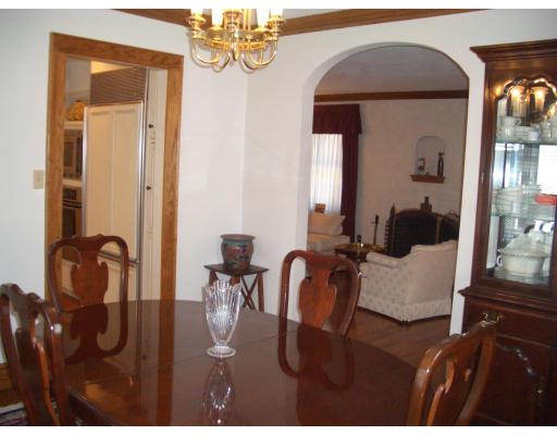 12 Burnside Road Newton, MA 02461 - Photo 5 of 18 a living room with furniture and a chandelier