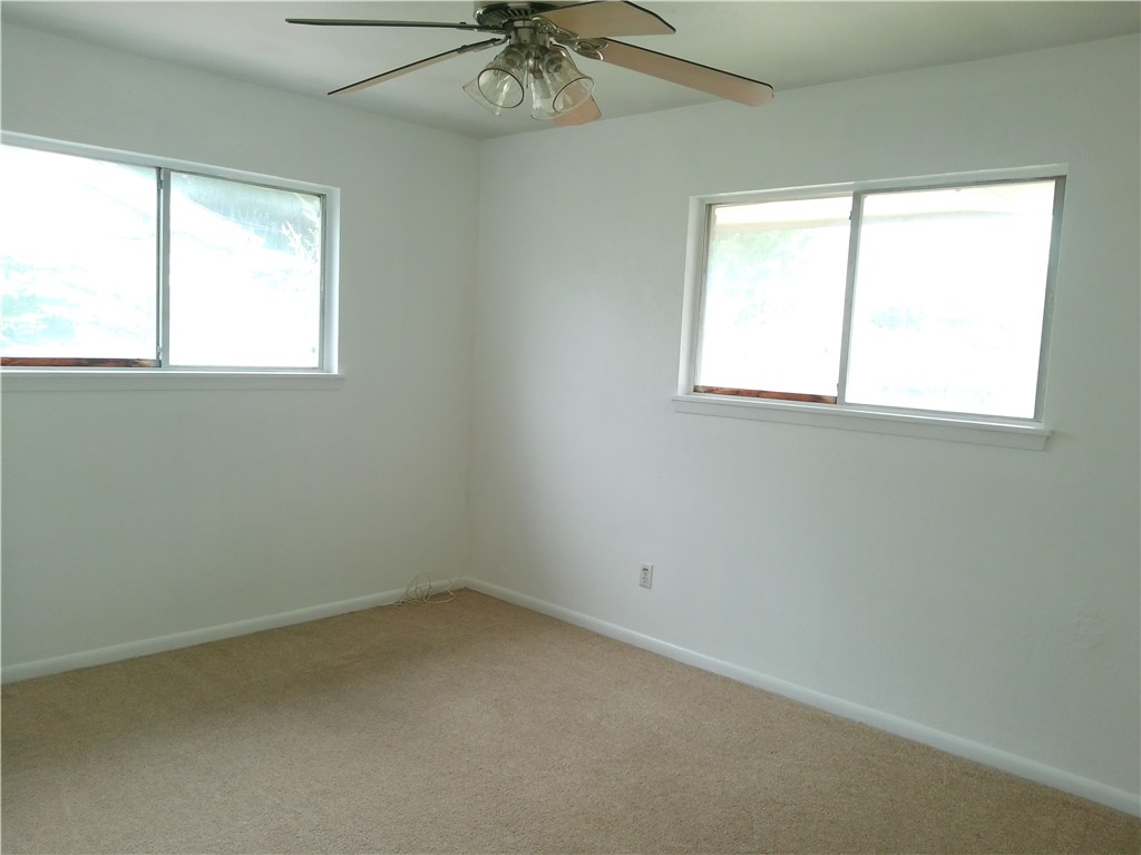 4117 Monaco Street Corpus Christi, TX 78411 - Photo 13 of 17 an empty room with a window