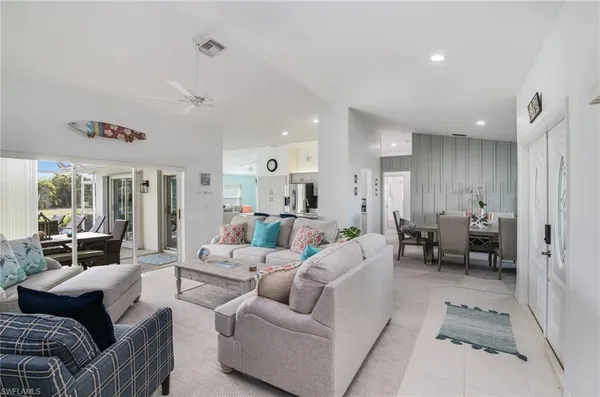 a living room with furniture and a couch