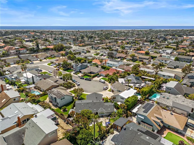an aerial view of residential building with parking space
