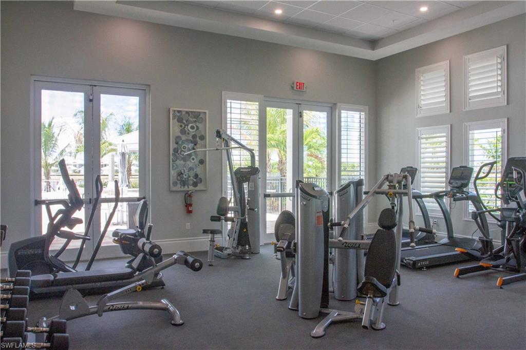 262 Indies Drive East, Unit 101 Naples, FL 34114 - Photo 28 of 32 a view of a room with gym equipment