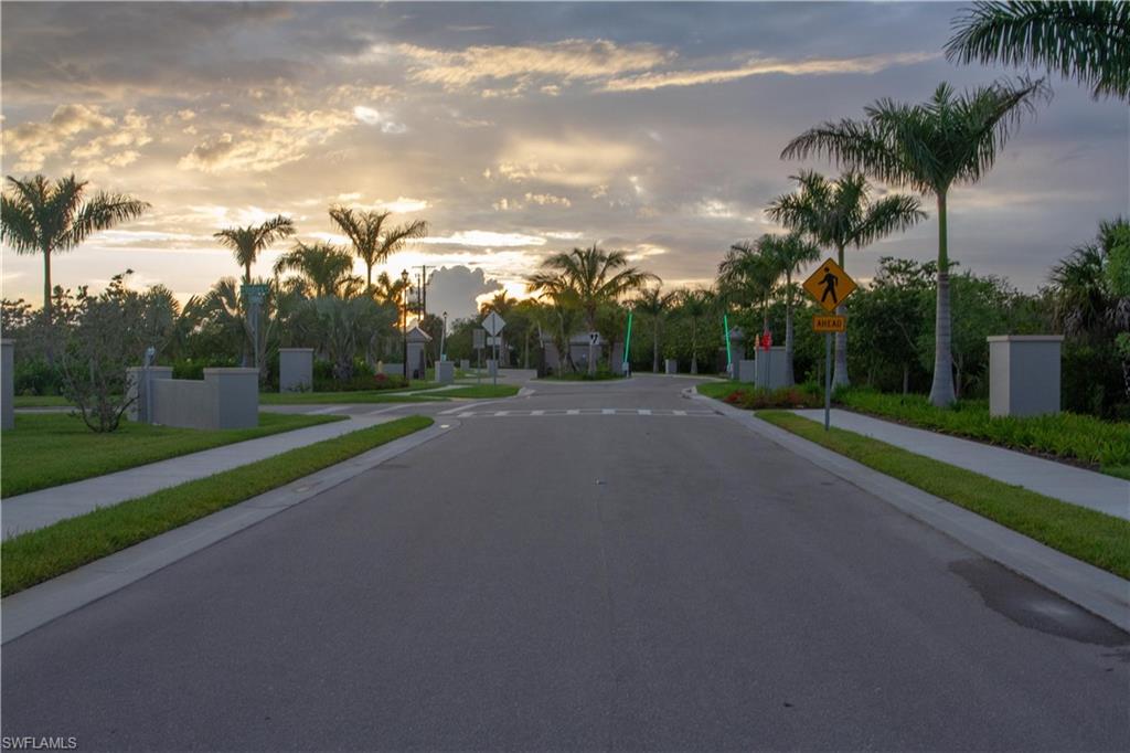 262 Indies Drive East, Unit 101 Naples, FL 34114 - Photo 32 of 32 a view of a street