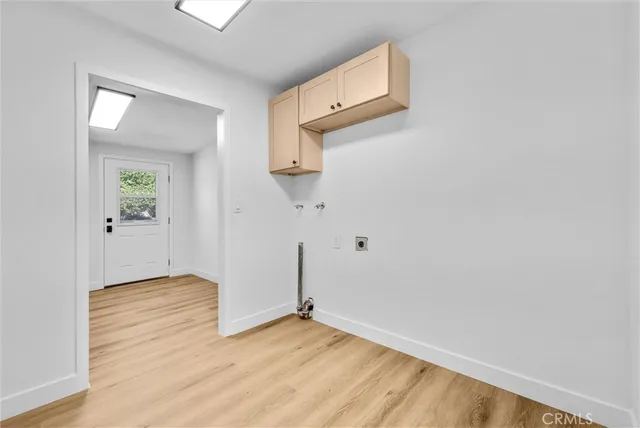 wooden floor in a hall with an entryway