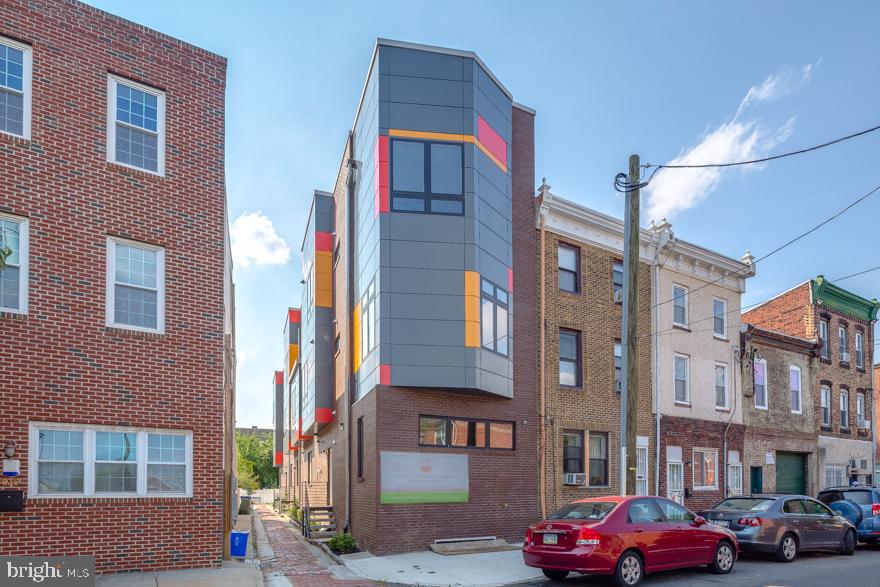 934 South 5th Street, Unit B2 Philadelphia, PA 19147 - Photo 11 of 11 a front view of a building with a street