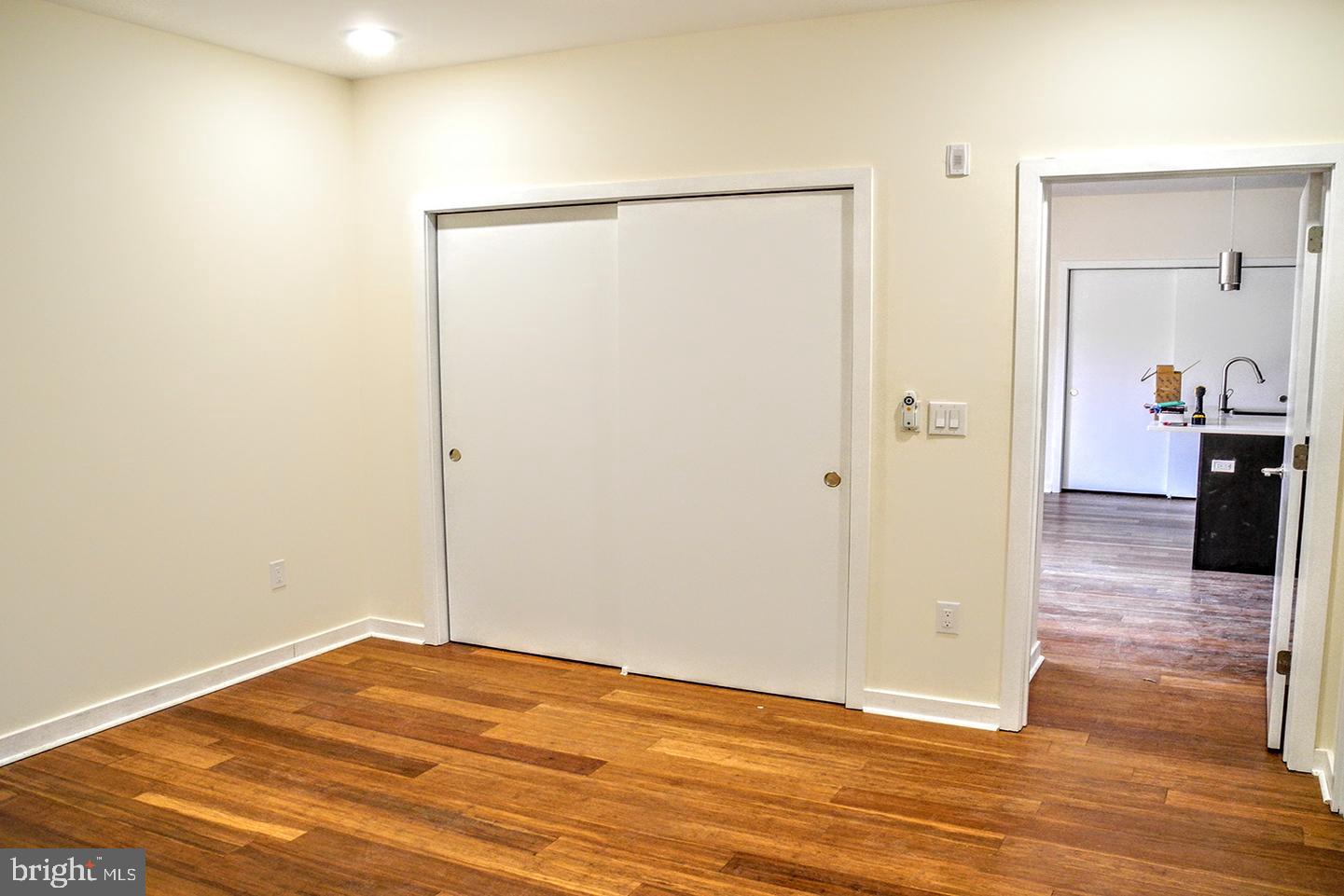 934 South 5th Street, Unit B2 Philadelphia, PA 19147 - Photo 7 of 11 a view of empty room with wooden floor