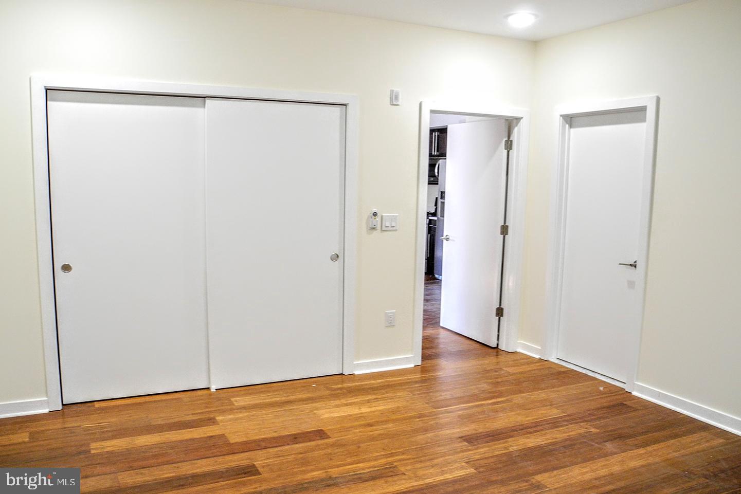 934 South 5th Street, Unit B2 Philadelphia, PA 19147 - Photo 8 of 11 a view of an empty room with wooden floor
