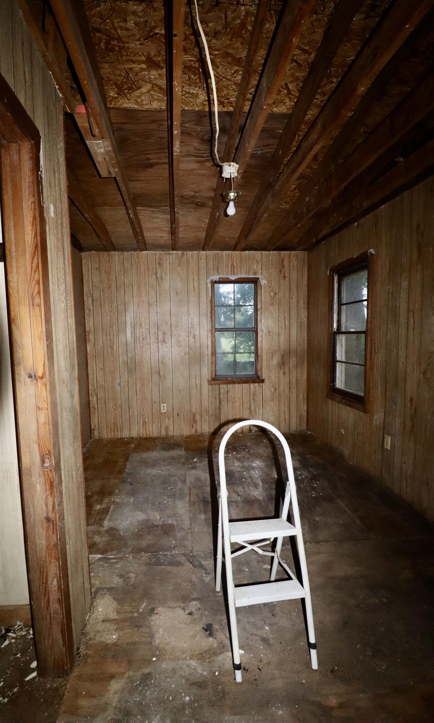 224 Kellar Avenue Ripley, TN 38063 - Photo 14 of 26 a room with exposed pipes and a rug