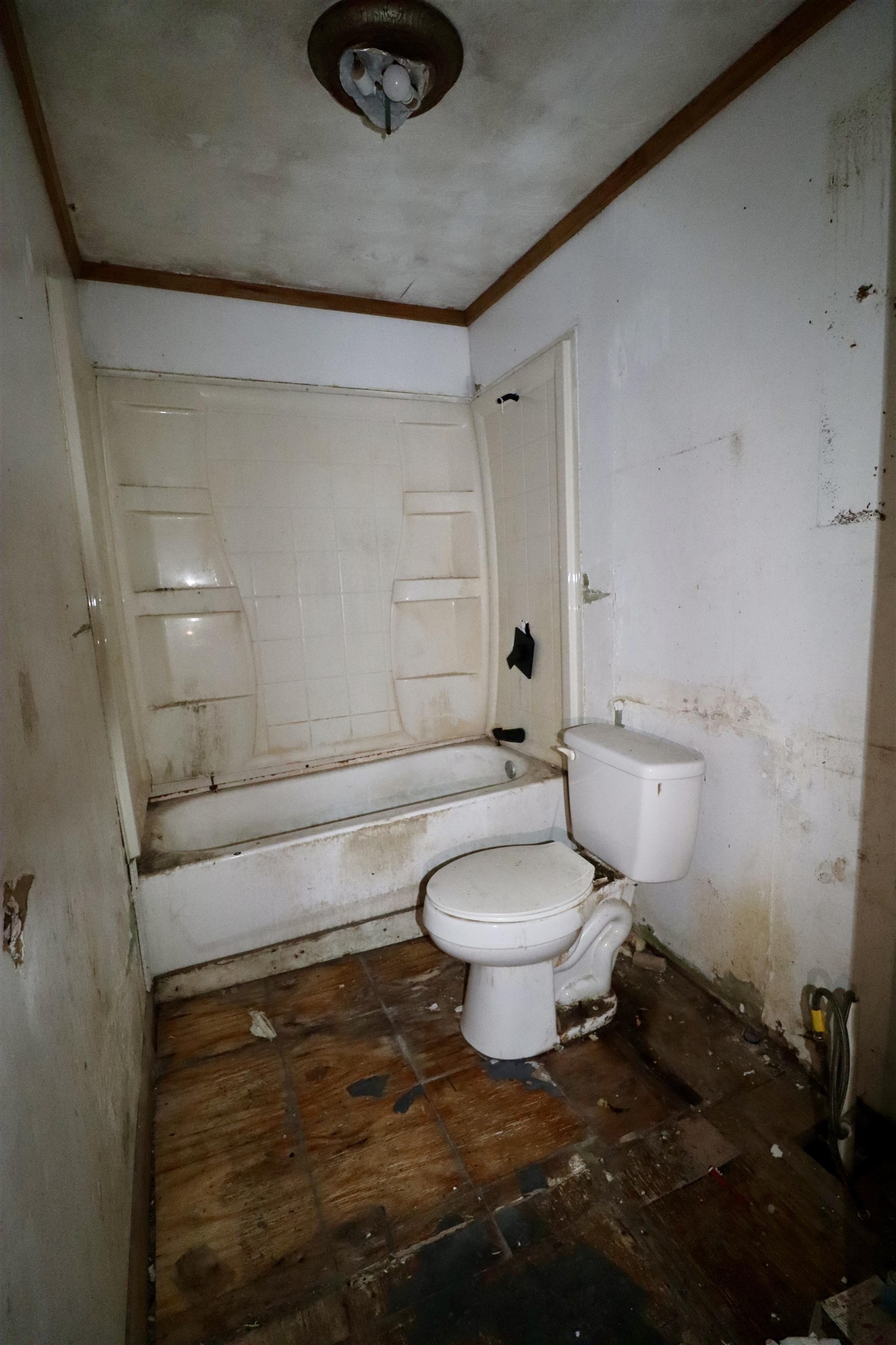 224 Kellar Avenue Ripley, TN 38063 - Photo 16 of 26 a bathroom with a toilet and a shower