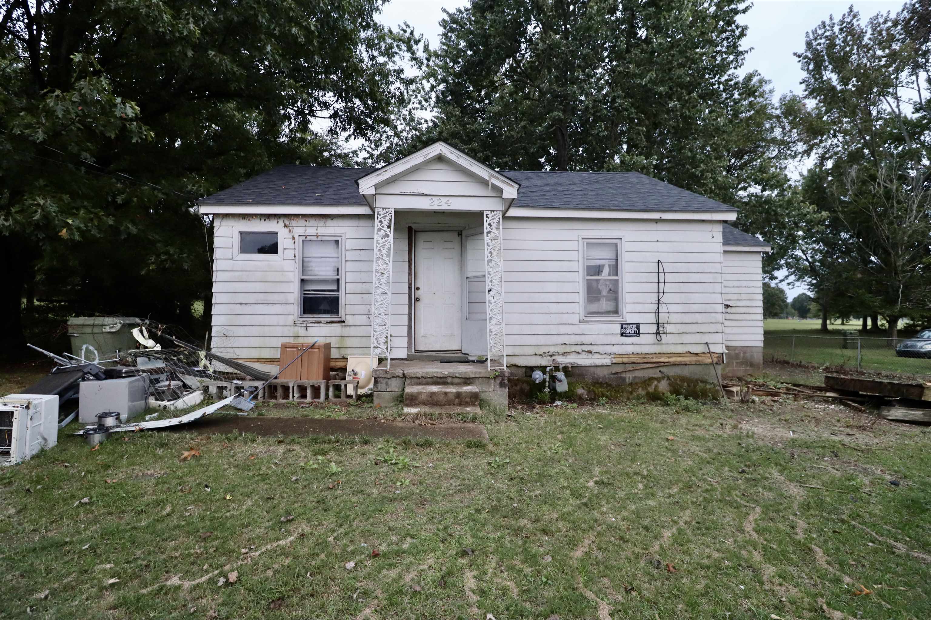 224 Kellar Avenue Ripley, TN 38063 - Photo 20 of 26 a front view of house with yard and trees