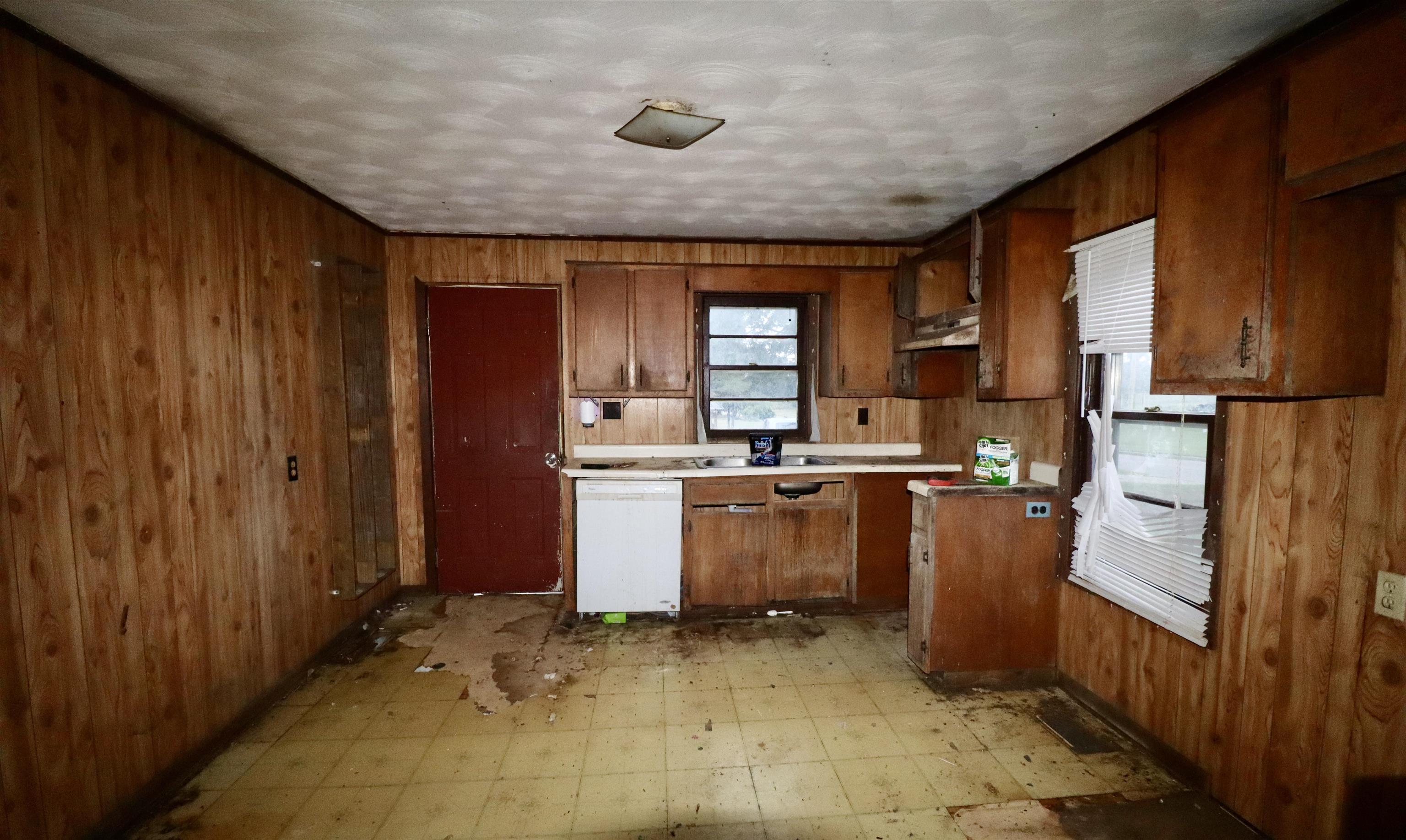224 Kellar Avenue Ripley, TN 38063 - Photo 4 of 26 a room with sink and cabinets