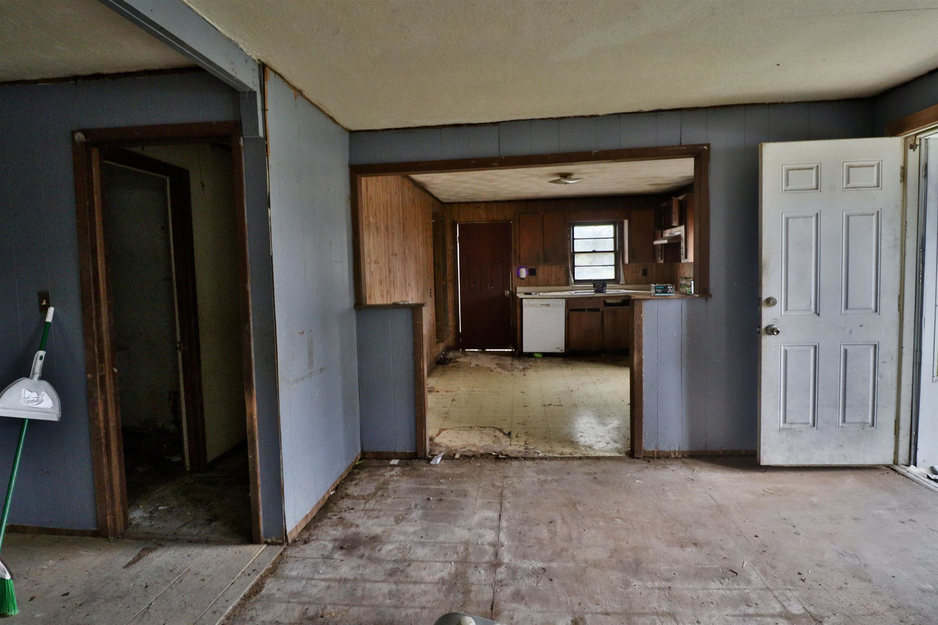 224 Kellar Avenue Ripley, TN 38063 - Photo 7 of 26 a view of a hallway with entryway and dining room