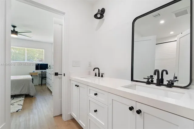 a bathroom with a bathtub and shower