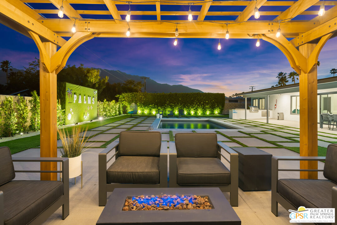 2775 East Verona Road Palm Springs, CA 92262 - Photo 1 of 73 a view of an outdoor sitting area with a patio