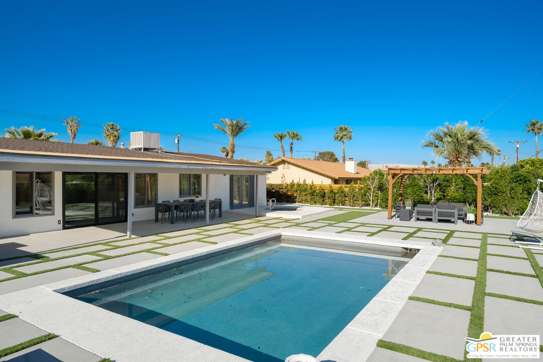 2775 East Verona Road Palm Springs, CA 92262 - Photo 14 of 73 a view of a house with swimming pool