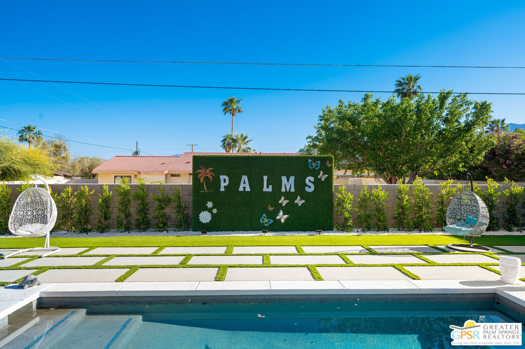 2775 East Verona Road Palm Springs, CA 92262 - Photo 19 of 73 a view of swimming pool with a yard