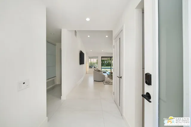 a kitchen with a sink cabinets and window
