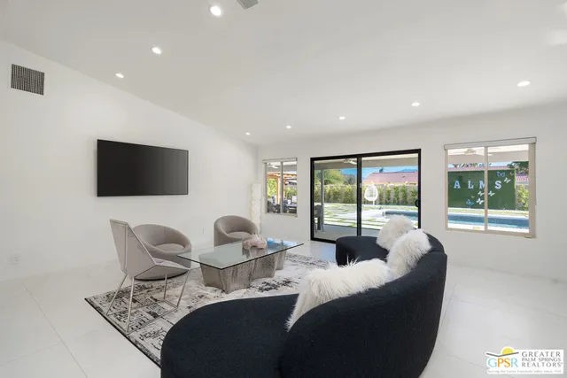 a kitchen with a sink cabinets and stainless steel appliances