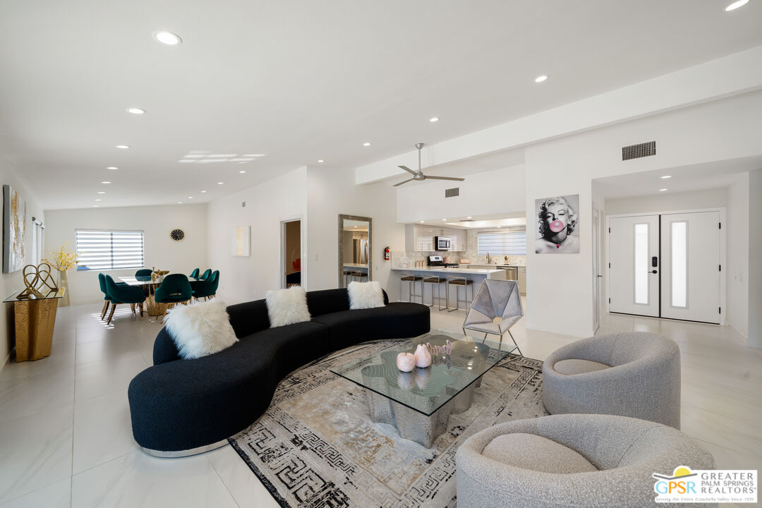 2775 East Verona Road Palm Springs, CA 92262 - Photo 33 of 73 a living room with furniture and a large window