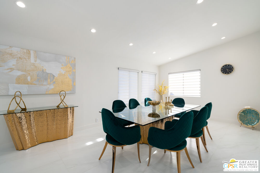 2775 East Verona Road Palm Springs, CA 92262 - Photo 40 of 73 a view of a dining room with furniture and window