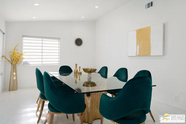 a view of a swimming pool with a yard