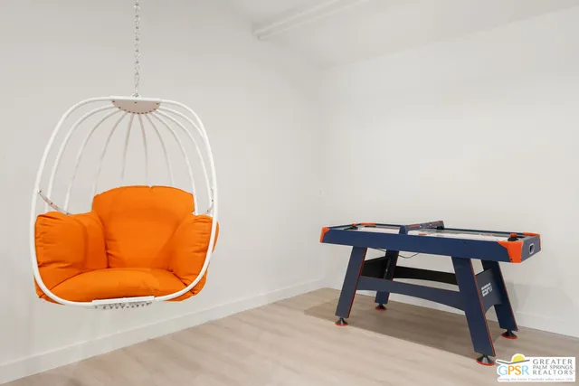 a view of a swimming pool with a lounge chairs