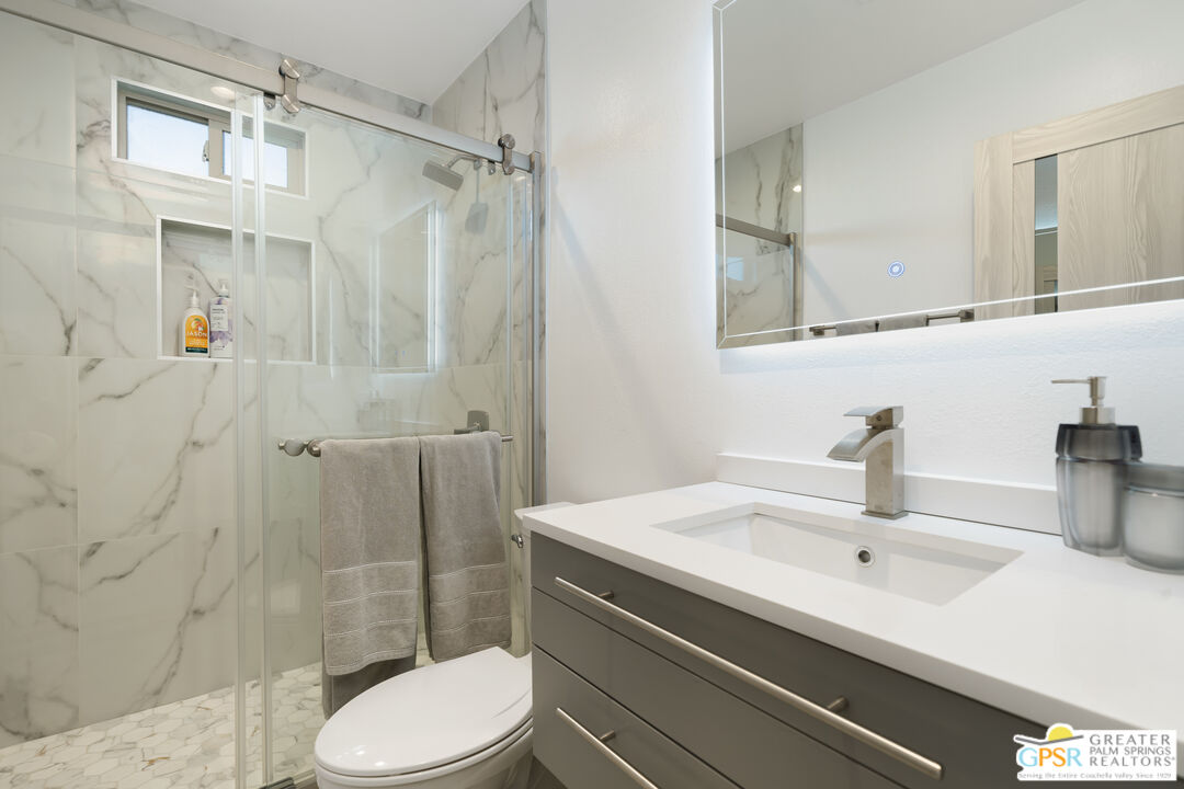 2775 East Verona Road Palm Springs, CA 92262 - Photo 48 of 73 a bathroom with a sink toilet and shower