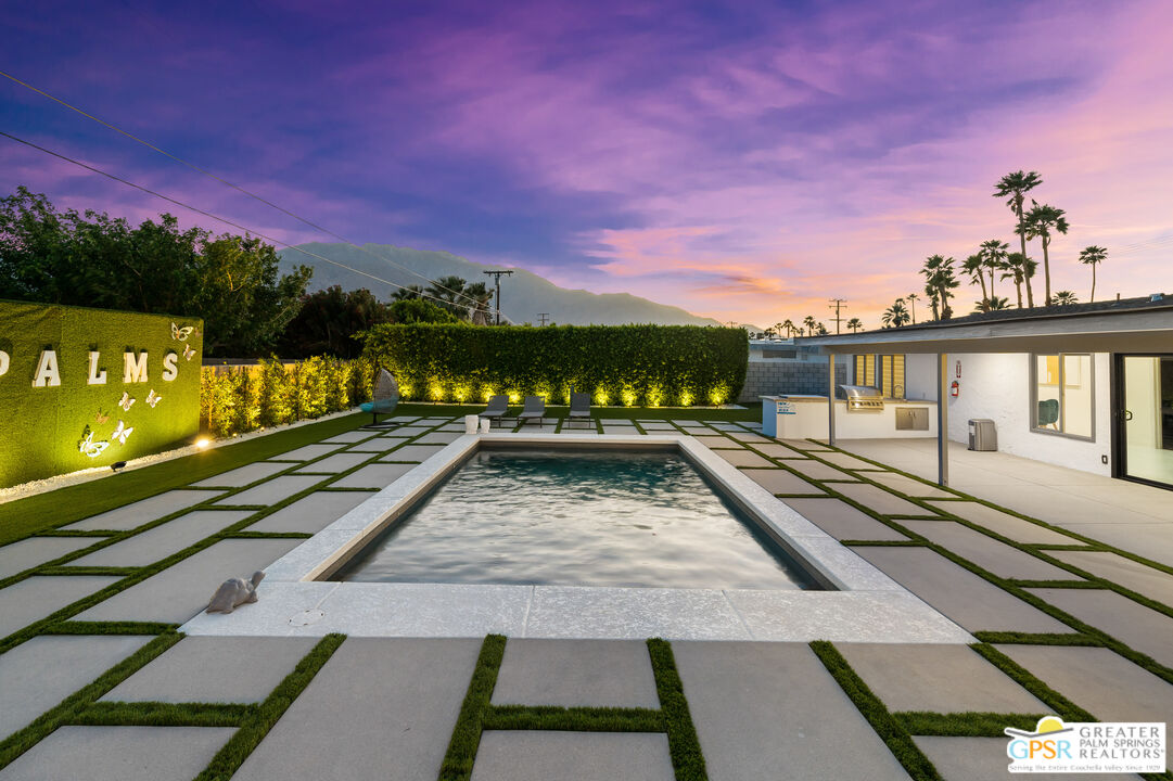 2775 East Verona Road Palm Springs, CA 92262 - Photo 63 of 73 a view of a balcony with wooden floor and a city view