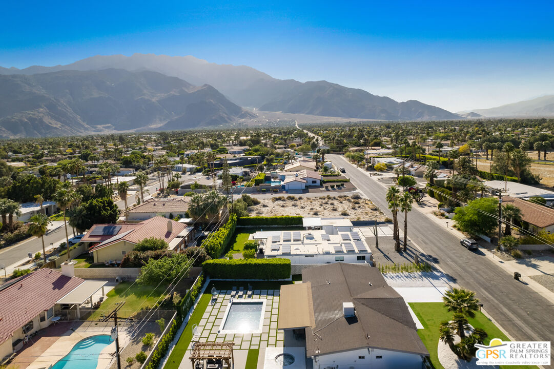 2775 East Verona Road Palm Springs, CA 92262 - Photo 7 of 73 an aerial view of residential houses and city view