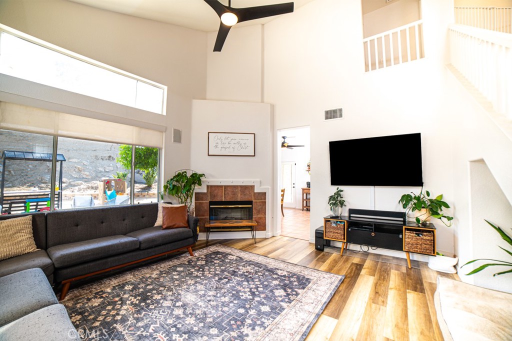 17801 Morning Rock Circle Riverside, CA 92503 - Photo 3 of 18 a living room with furniture and a flat screen tv