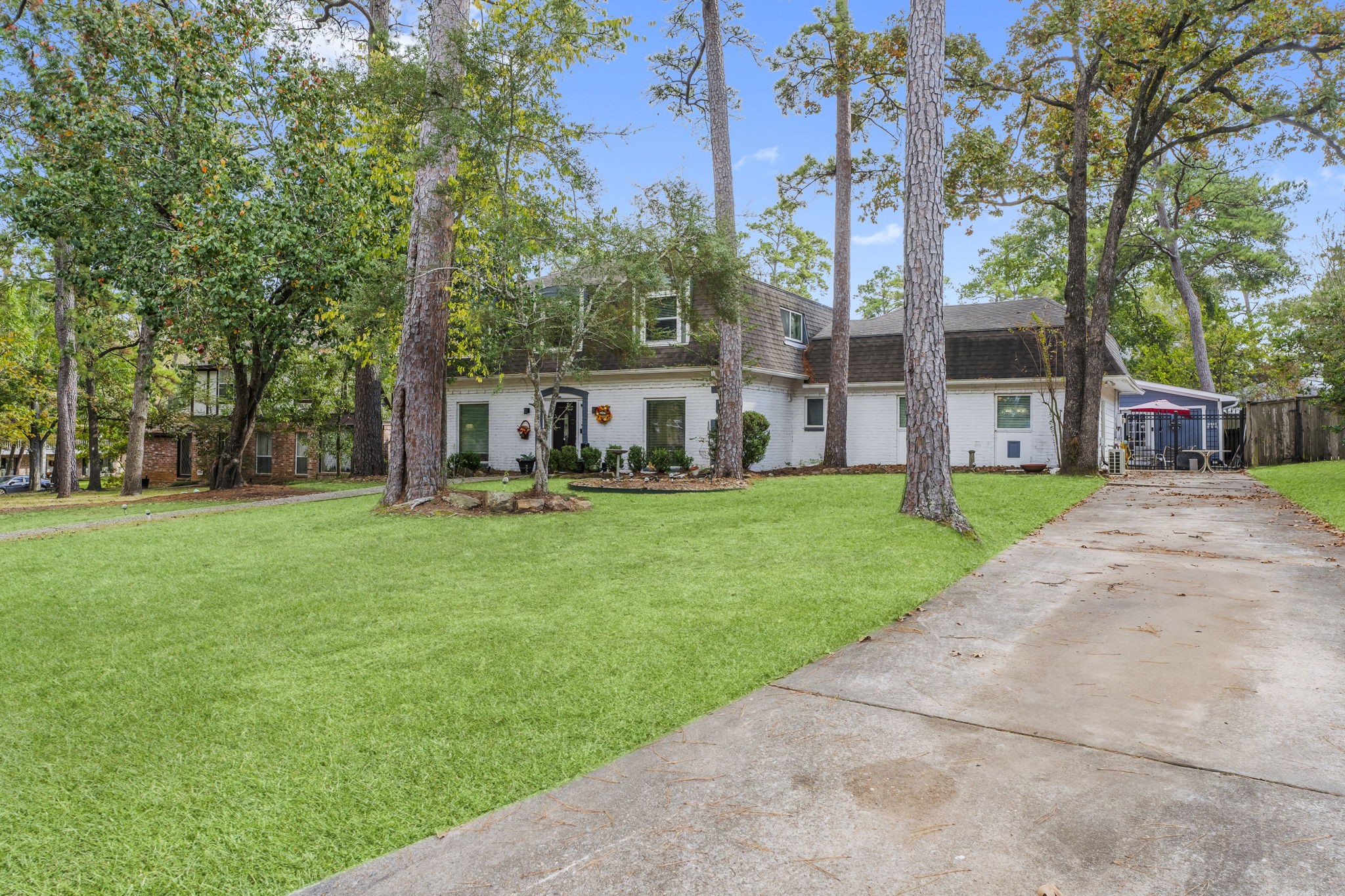 6107 Jadecrest Court Spring, TX 77389 - Photo 3 of 34 Grass enhanced by photographers