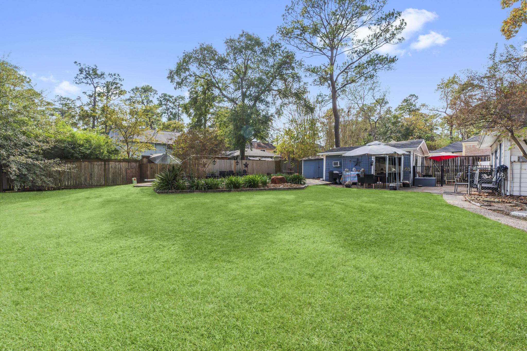 6107 Jadecrest Court Spring, TX 77389 - Photo 32 of 34 Grass enhanced by photographers