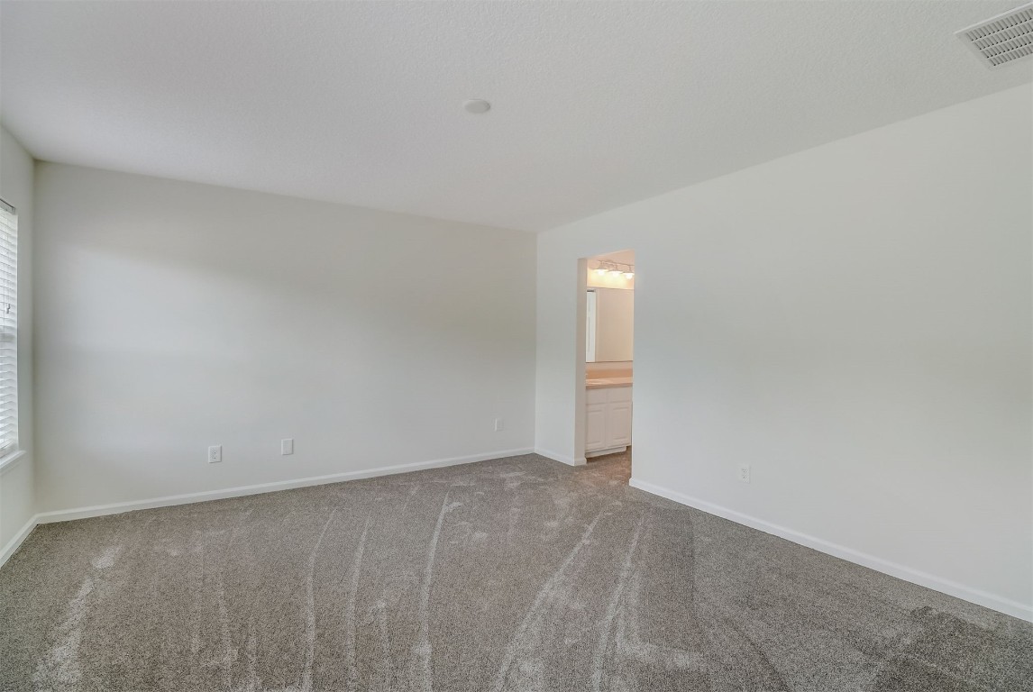 96099 Starlight Lane Yulee, FL 32097 - Photo 13 of 36 a view of an empty room and window