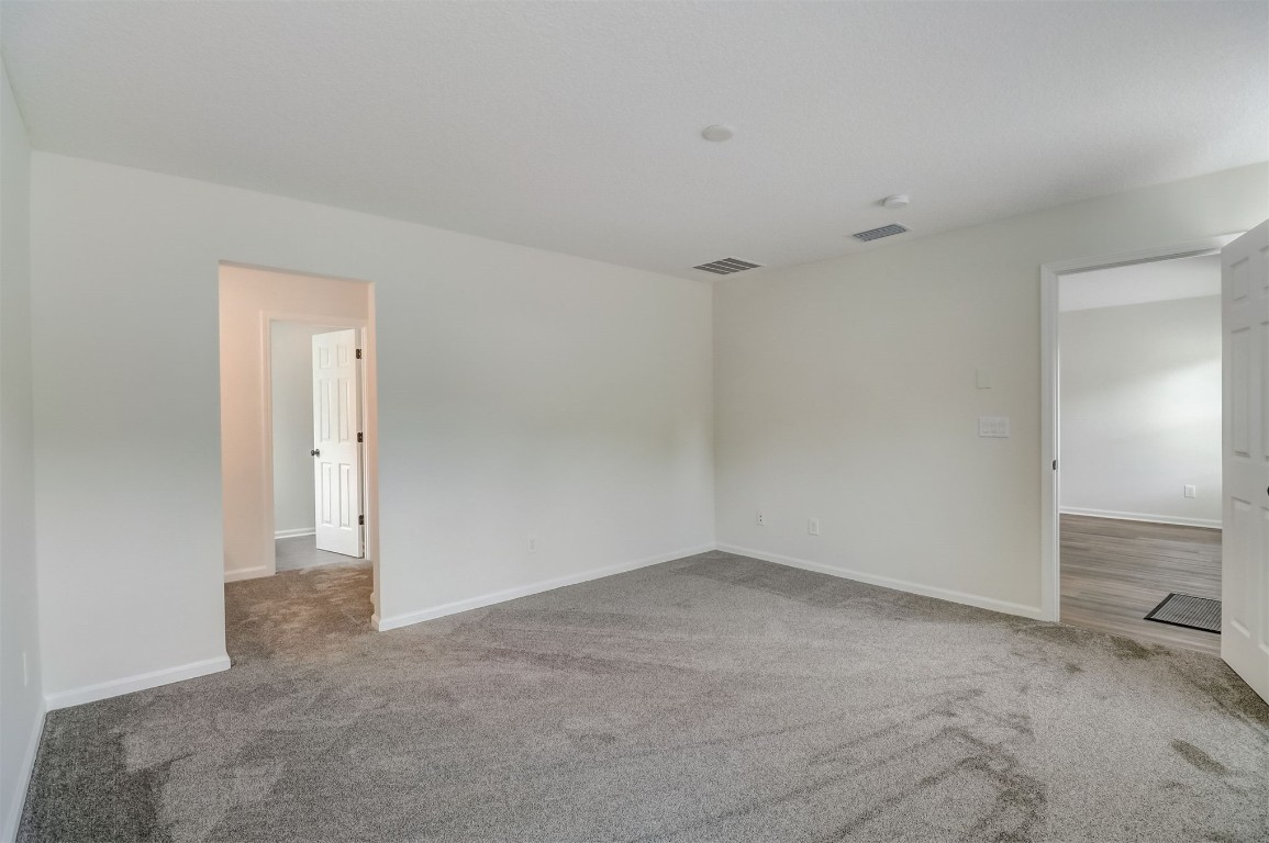 96099 Starlight Lane Yulee, FL 32097 - Photo 14 of 36 a view of an empty room